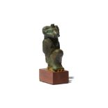 AN EGYPTIAN BRONZE FIGURE OF RAM-HEADED AMUN