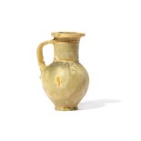 AN EGYPTIAN ALABASTER JUG