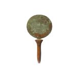 AN EGYPTIAN BRONZE MIRROR