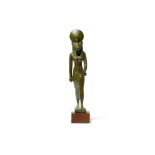 AN EGYPTIAN BRONZE FIGURE OF STRIDING SEKHMET