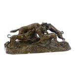 A 20th Century bronze figural group of a pack of three dogs attacking wolf,