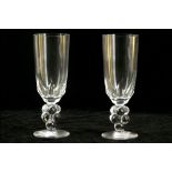 A pair of Lalique glass Clos Vougeot champagne glasses