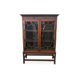 A late 19th Century to early 20th Century mahogany display cabinet