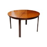 A 1970s teak circular dining table, possibly Danish, together with six FF Caffrance chairs