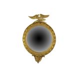 A Regency style gilt mirror of circular form