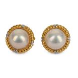 A pair of mabé pearl earrings