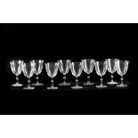 A set of ten 1980s Lalique crystal red wine glasses,