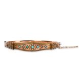 A turquoise and seed pearl bangle,1906