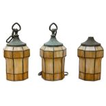 Arts and Crafts, a set of three hall lanterns in the style of Duffner & Kimberley