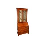 A George III oak bureau bookcase