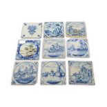 A collection of nine 18th Century and later Dutch Delft blue and white tiles,