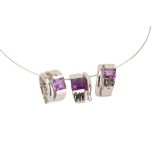 An amethyst pendant necklace and earring suite