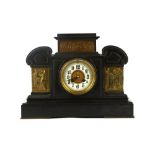 A late Victorian slate based black marble mantel clock
