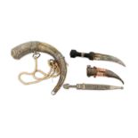 A 20th Century Moroccan Jambiya or dagger with curved double edged fullered blade,