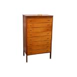 A mid 20th Century teak chest of eight drawers