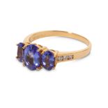 A tanzanite three-stone ring