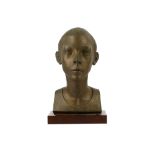 A first half 20th Century bronze bust of a young boy,