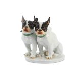 A 1950s Meissen porcelain sculpture of two French bulldogs,