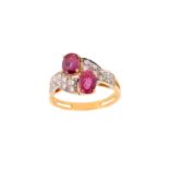 A garnet and diamond dress ring