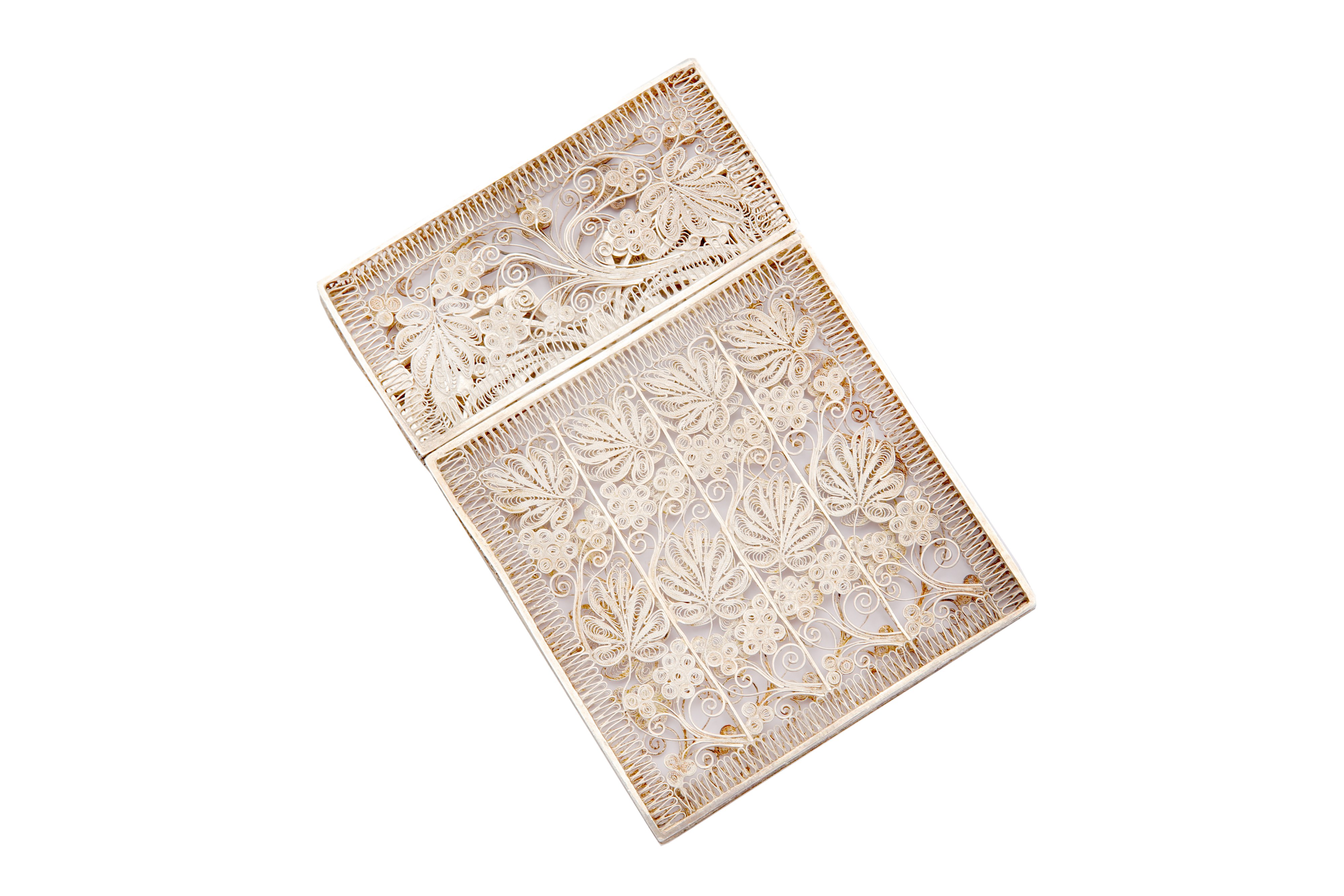 A filigree silver card case