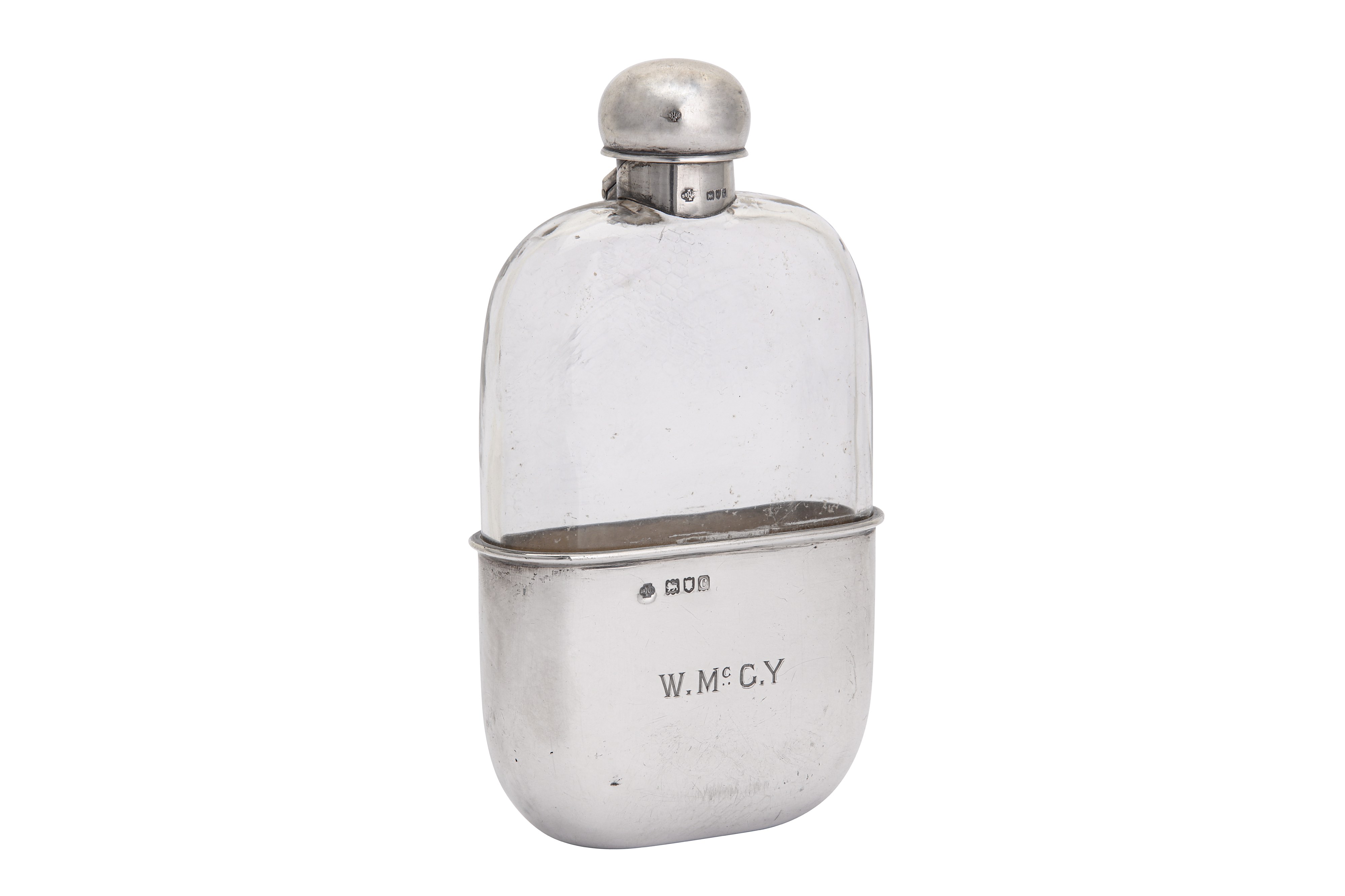 A late Victorian sterling silver mounted glass spirit hip flask, London 1898 by William Hutton & Son