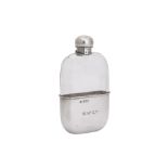 A late Victorian sterling silver mounted glass spirit hip flask, London 1898 by William Hutton & Son