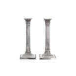 A pair of Edwardian sterling silver candlesticks, Sheffield 1905 by Walter Latham & Son