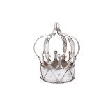 A large silver plated wine cooler modelled as a crown,