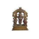 A BRONZE ALTARPIECE WITH VISHNU AND ATTENDANTS