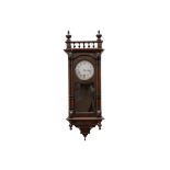 An early 20th Century stained beech Vienna regulator style clock