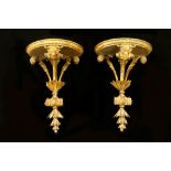 A pair of early 20th Century Italian carved and gilt wall sconces