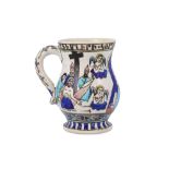 A KUTAHYA POTTERY JUG WITH CHRISTIAN ICONOGRAPHY