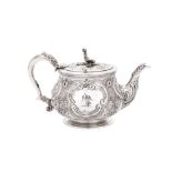 A George IV sterling silver bachelor teapot, marked for London 1825 by Jonathon Hayne to base
