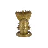 A LARGE BRASS SHIVA LINGAM COVER