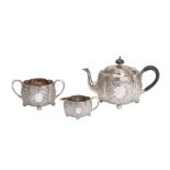 A Victorian sterling silver three-piece bachelor tea service, London 1886 by Horace Woodward & Co (E