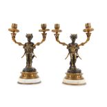 A PAIR OF 19TH CENTURY FRENCH BRONZE CANDELABRA AFTER A MODEL BY CLODION