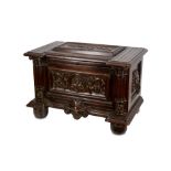 A 19TH CENTURY RENAISSANCE STYLE CARVED OAK CASKET