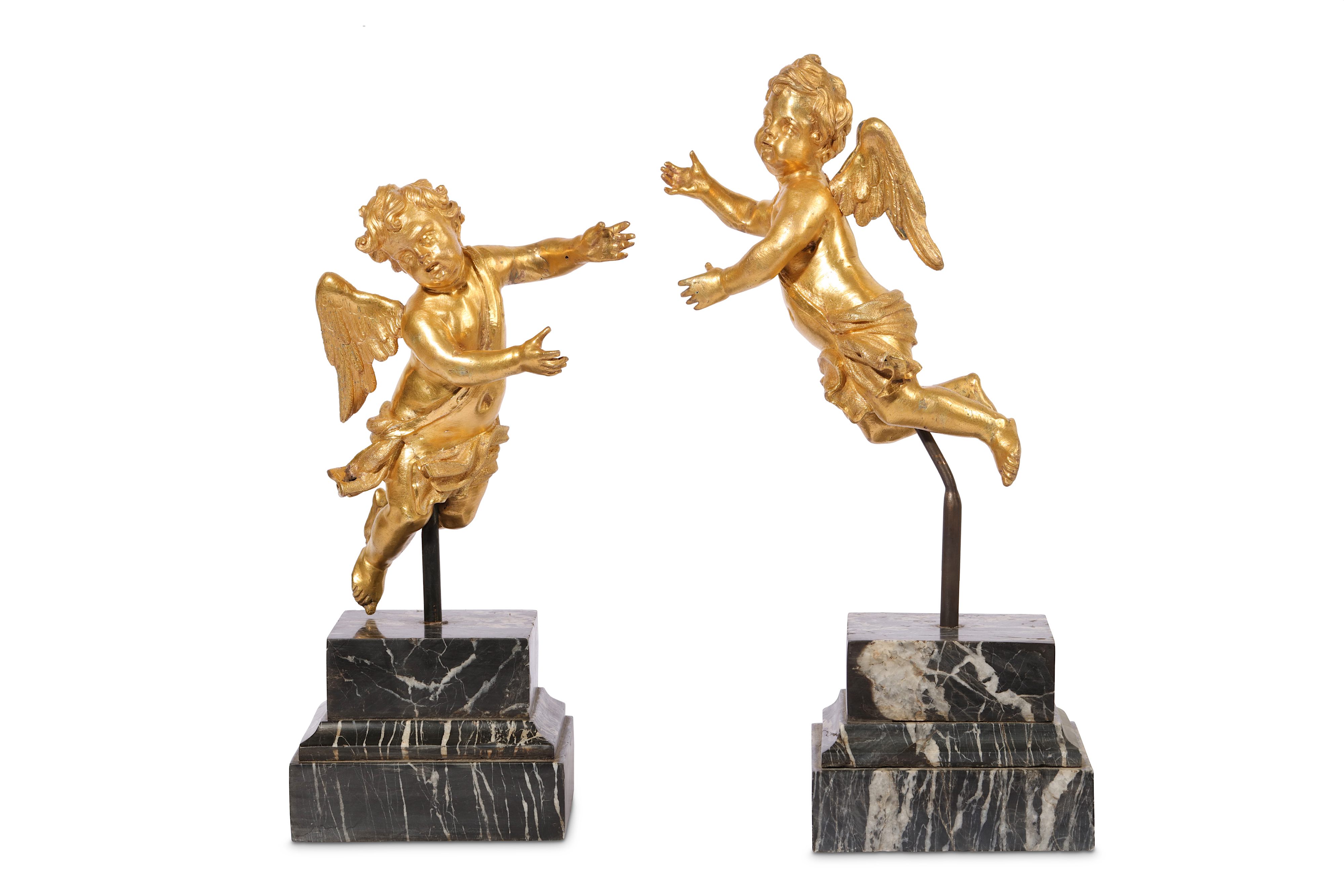 A PAIR OF SECOND HALF 17TH CENTURY ITALIAN (ROME) GILT BRONZE WINGED CHERUBS IN FLIGHT