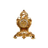 A LATE 19TH CENTURY FRENCH GILT BRONZE ROCOCO STYLE MANTEL CLOCK