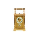 A LATE 19TH CENTURY FRENCH GILT BRASS PETITE SONNERIE CARRIAGE CLOCK WITH ALARM AND REPEAT