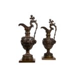 A PAIR OF LATE 19TH CENTURY BRONZE EWERS AFTER CLODION