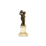 A LATE 19TH CENTURY FRENCH BRONZE AND WHITE MARBLE FIGURAL CANDLESTICK