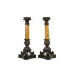 A PAIR OF EARLY 19TH CENTURY ITALIAN BRONZE AND SIENNA MARBLE CANDLESTICKS