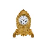 A MID 19TH CENTURY FRENCH GILT BRONZE MANTEL CLOCK IN THE ROCOCO STYLE