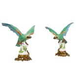 A PAIR OF 19TH CENTURY SAMSON PORCELAIN PARROTS WITH ORMOLU MOUNTS