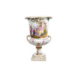 A 19TH CENTURY DRESDEN PORCELAIN URN WITH GILT BRONZE MOUNTS