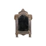 AN 18TH CENTURY NORTH EUROPEAN SILVERED BRASS TABLE MIRROR