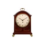 AN EARLY 19TH CENTURY MAHOGANY AND BRASS MOUNTED FUSEE BRACKET CLOCK