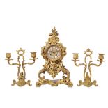A MID 19TH CENTURY FRENCH GILT BRONZE CLOCK GARNITURE IN THE ROCOCO STYLE