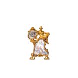 A LATE 19TH CENTURY VIENNESE GILT BRONZE AND ENAMEL FIGURAL BOUDOIR CLOCK